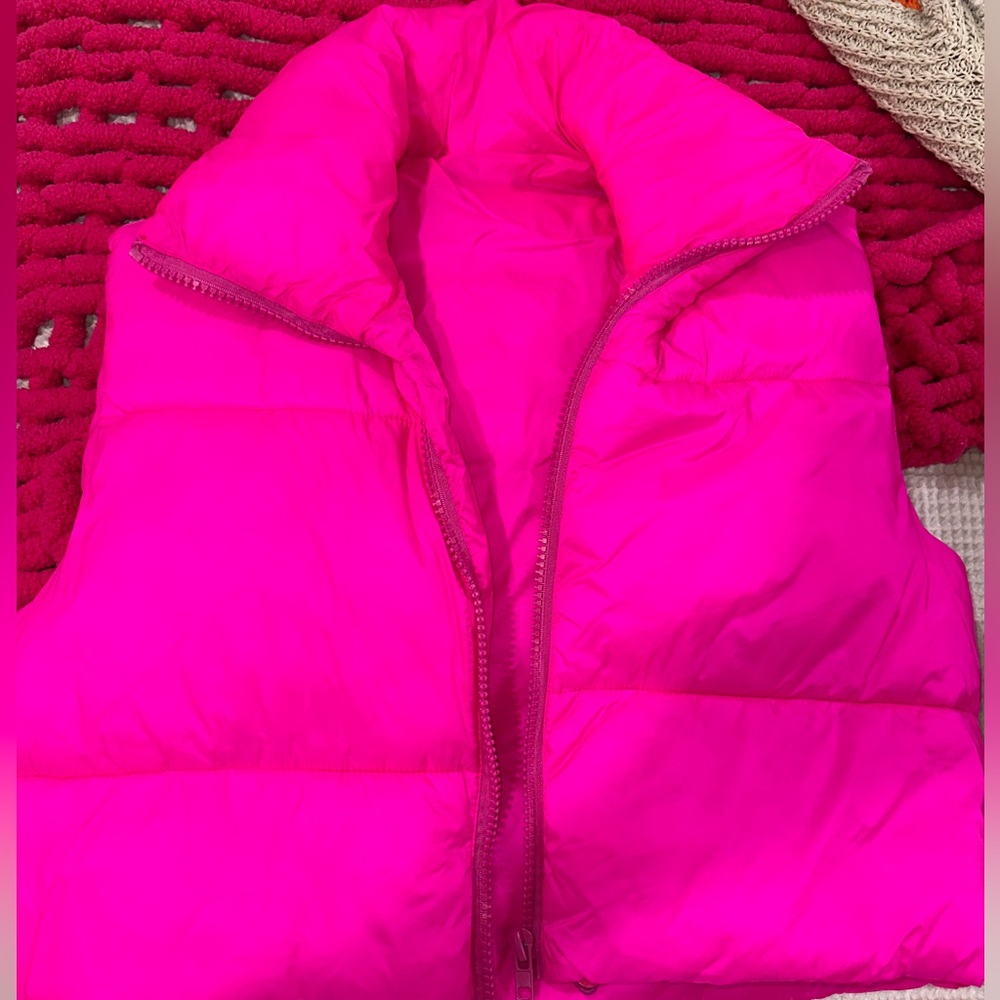 women’s pink puffer vest from amazon 
size Large